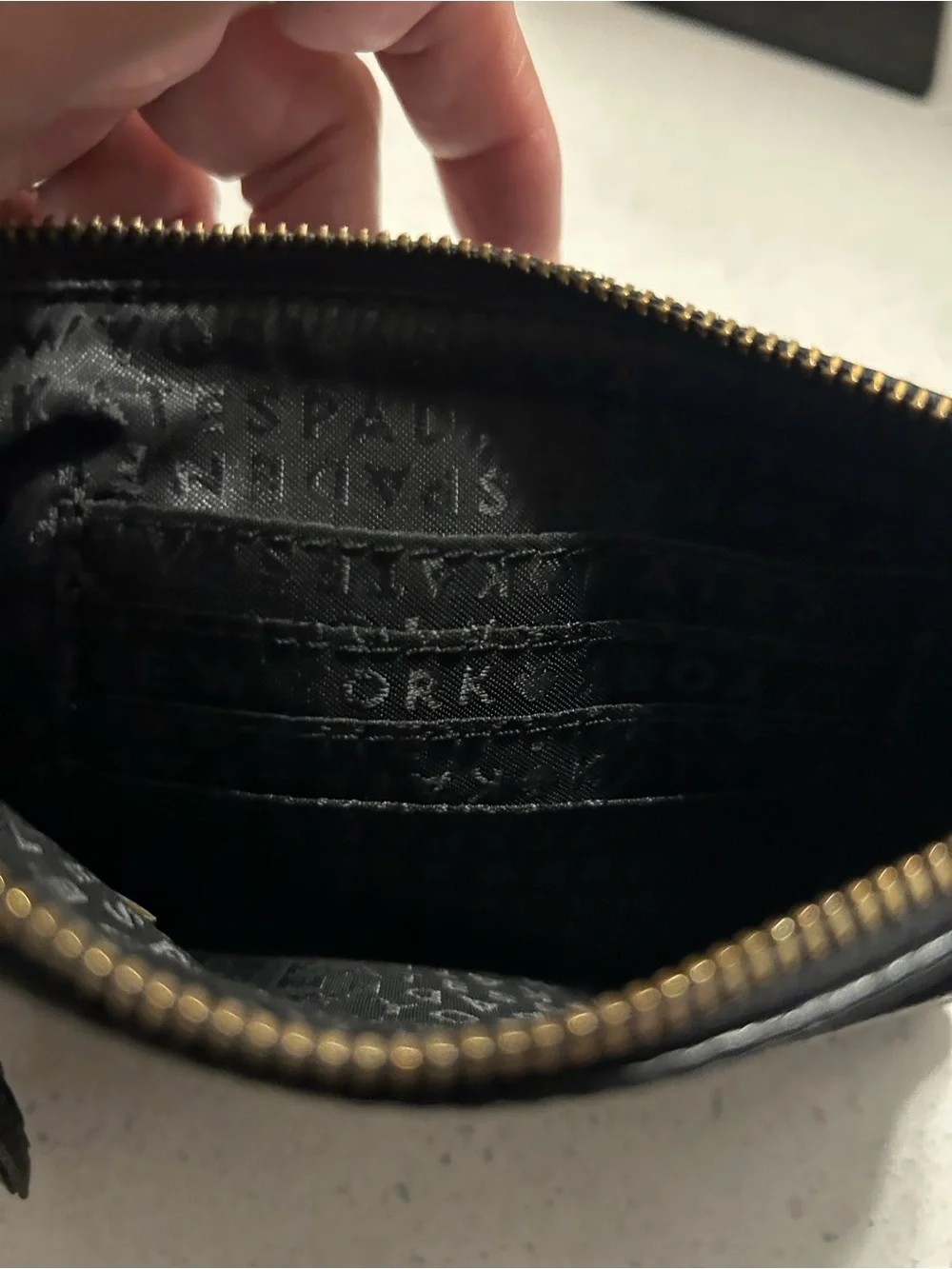 kate spade Black Pebble Leather Wristlet with Tassel